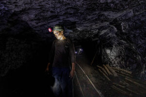 A miner in underground coal mine.